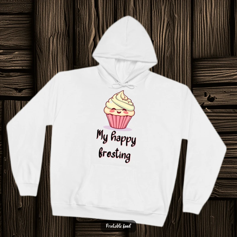 Funny hoodie with a giggling cupcake character puffing out frosting, cozy and perfect for sweet moments.