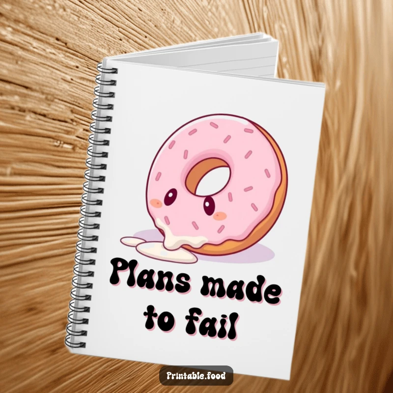 Funny notebook featuring a donut character comically tripping over its icing drizzle, ideal for jotting down notes humorously.